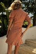 Emilia mini rust spot dress